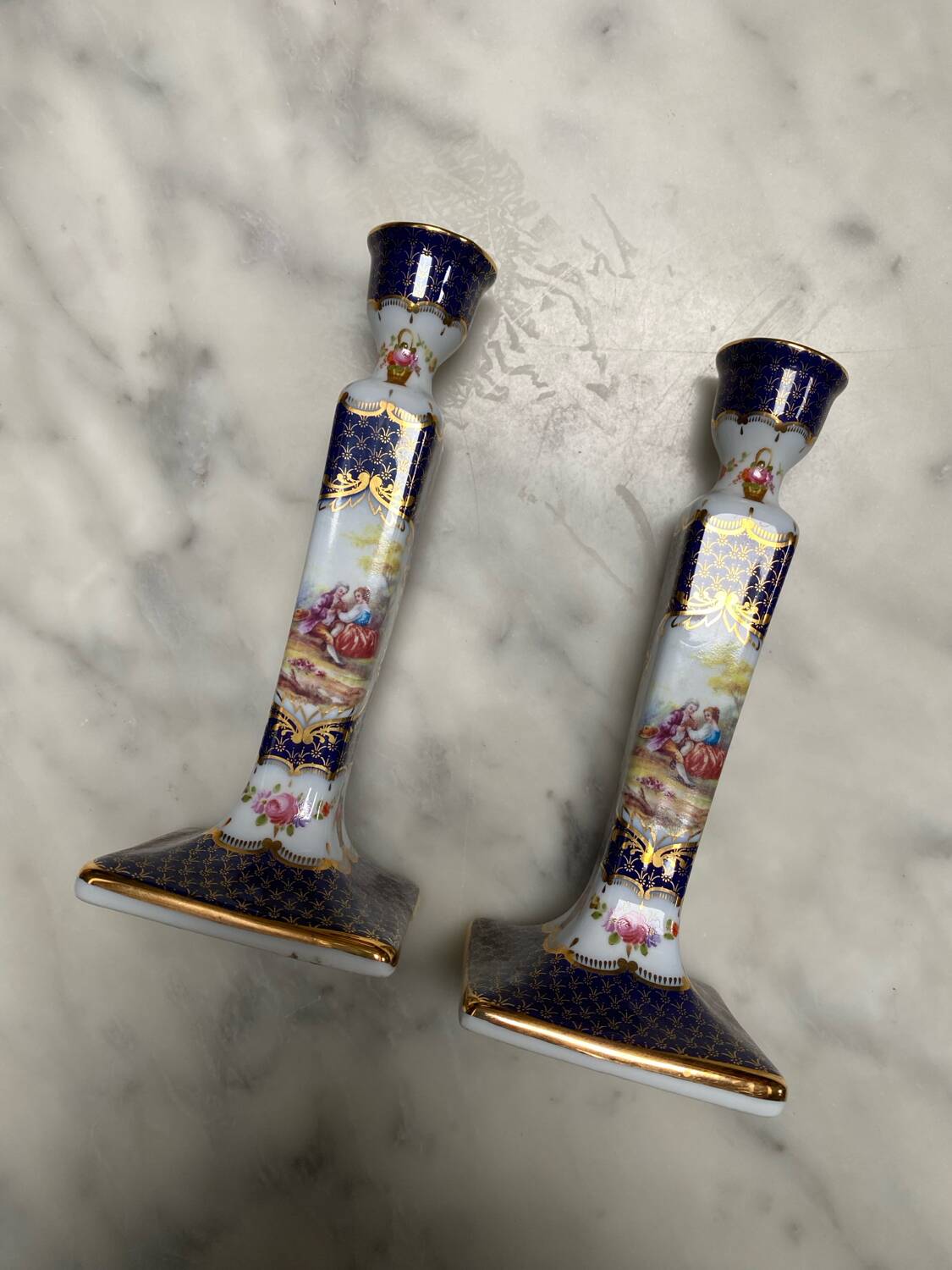 English porcelain clock and candle holders