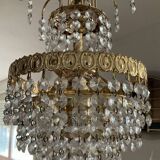 Cascade chandelier with crystal and brass tassels