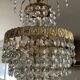 Cascade chandelier with crystal and brass tassels