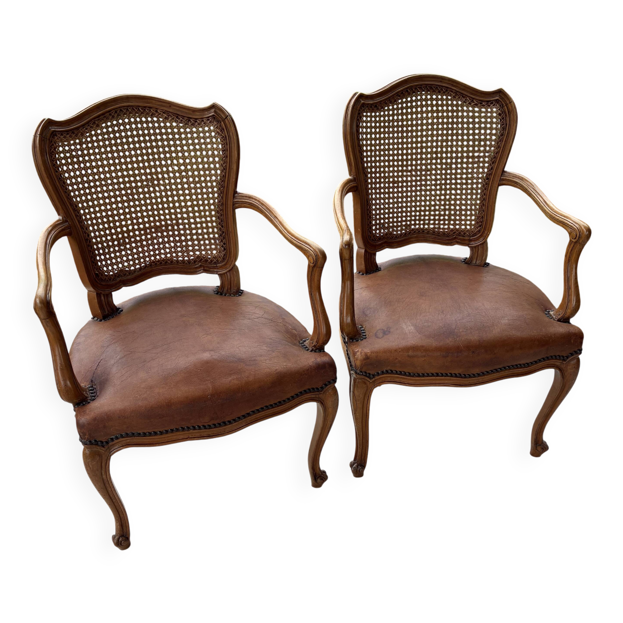 Cane and leather armchair in Louis XV style