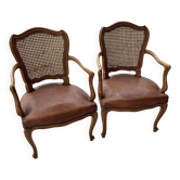 Cane and leather armchair in Louis XV style