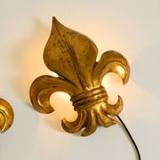 A pair of large 1970s gilt metal Fleur-de-Lis wall lamps by Hans Kögl