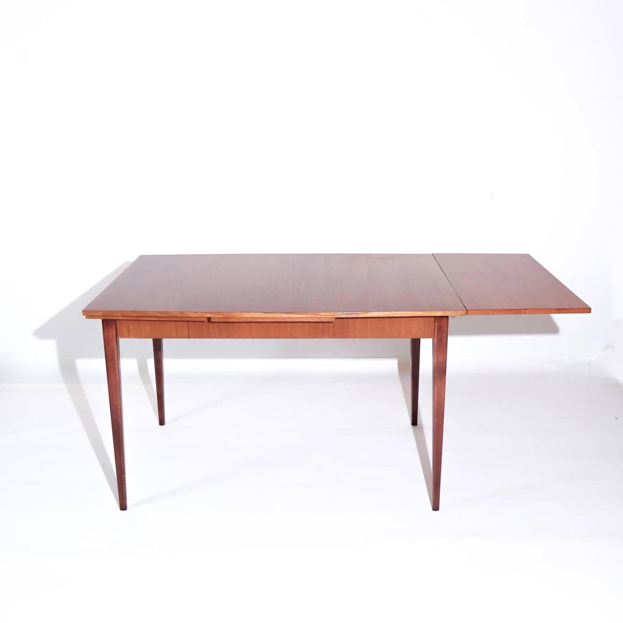 Mid-century modern Scandinavian dining table with extensions in teak, 1960s.