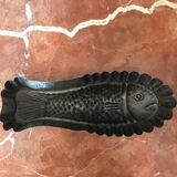 Old cake mold or chocolate fish