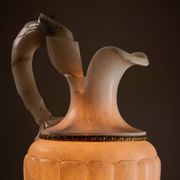 Carved alabaster urn lamp with stylized fish handle