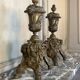 Pair of Louis XIV style andirons in bronze after a design by André-Charles Boulle.