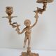Pair of vintage golden brass cherub candlesticks