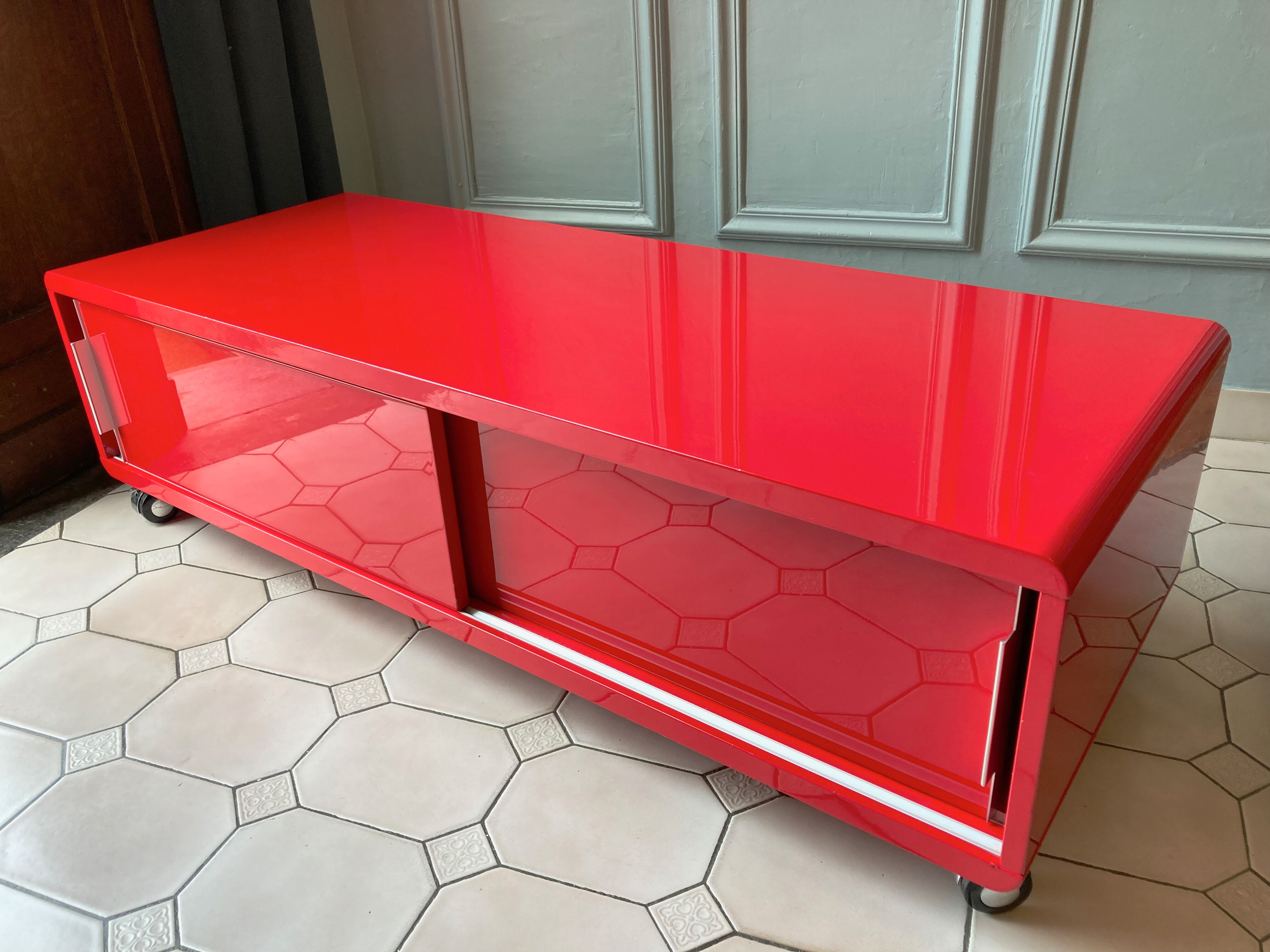 Lacquered red tv cabinet