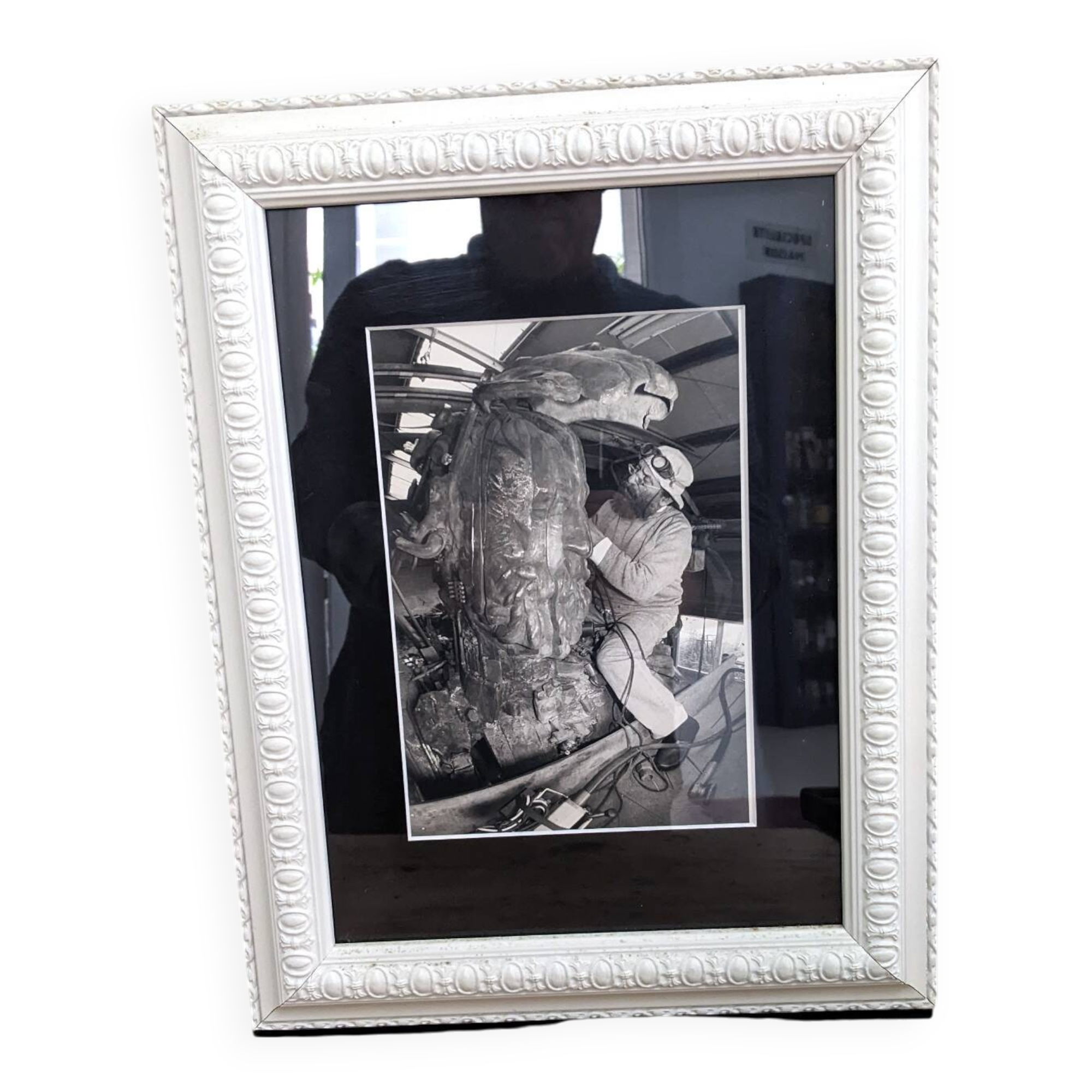 Black and white photo Cesar Baldaccini working on the framed centaur