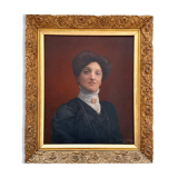 Old painting, portrait of a woman from the early 20th century.