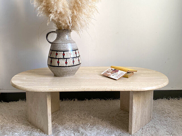 Oval coffee table in travertine
