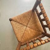 Corner straw chair "fireplace corner" in turned and beaded wood