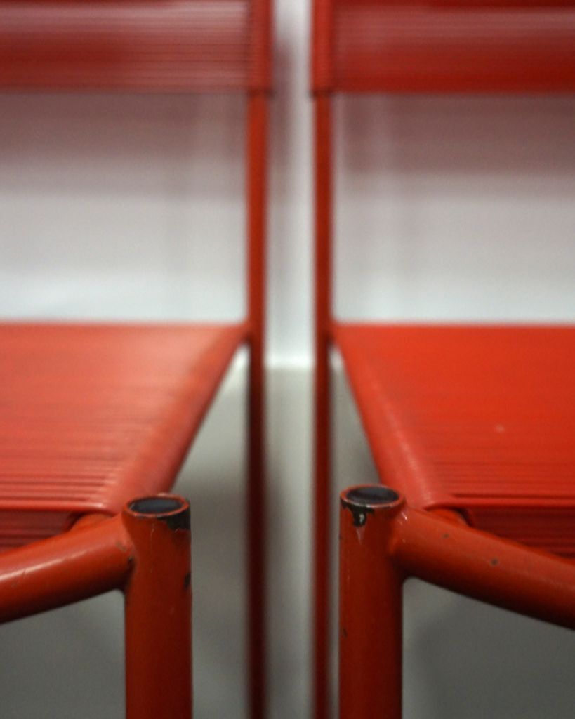 4 chaises rouges Spaghetti de Giandomenico Belotti pour Alias