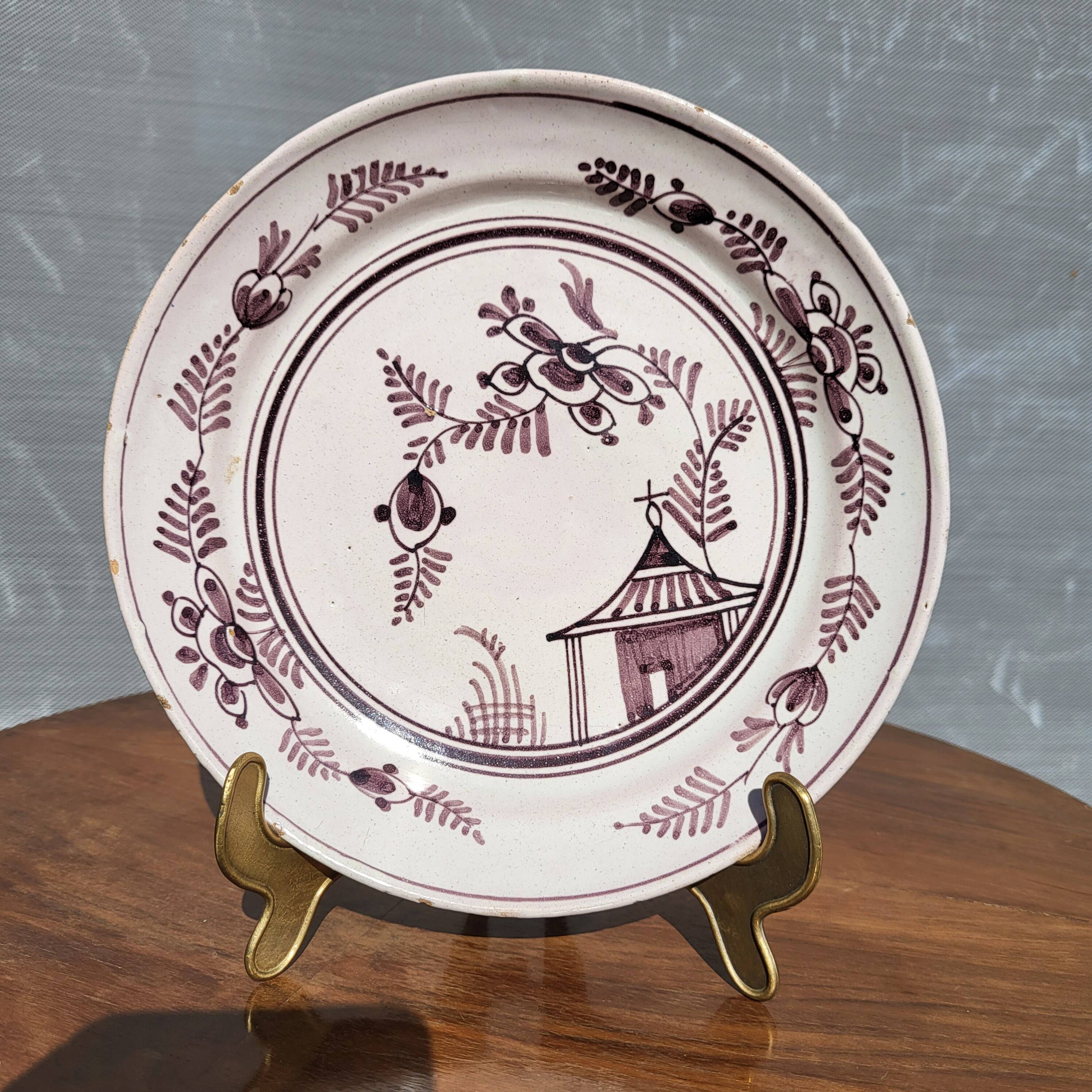 Grand Feu earthenware plate, Manganese decoration - 18th century