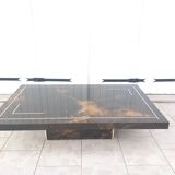 Table basse laquée à décor solaire