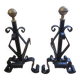 Pair of wrought iron andirons and brass ball.