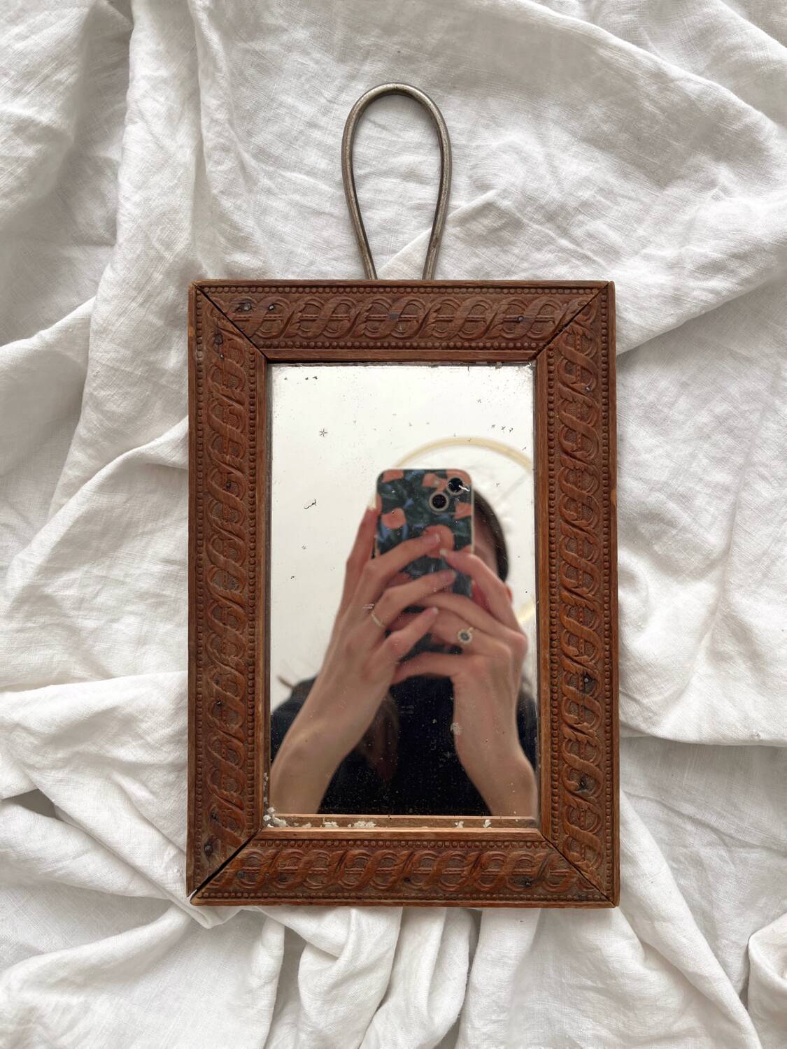 Antique mercury glass barber mirror and carved wooden frame