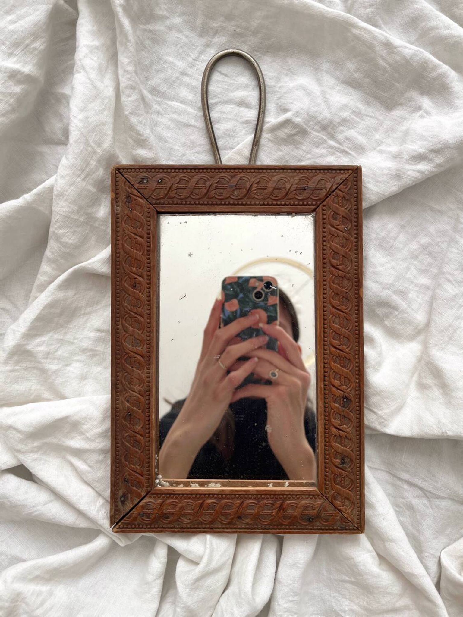 Antique mercury glass barber mirror and carved wooden frame