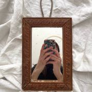 Antique mercury glass barber mirror and carved wooden frame