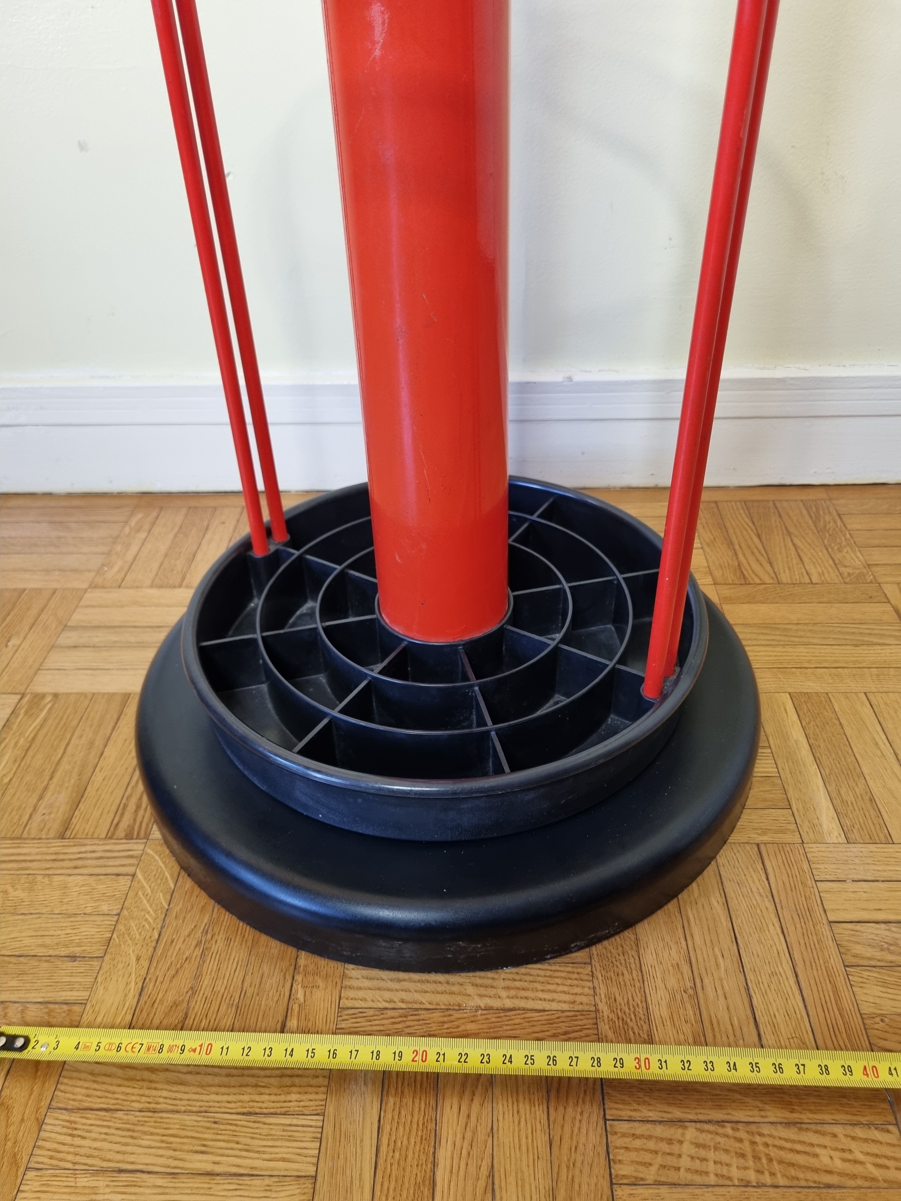 Coat rack in orange lacquered metal published by Seccose, 80s