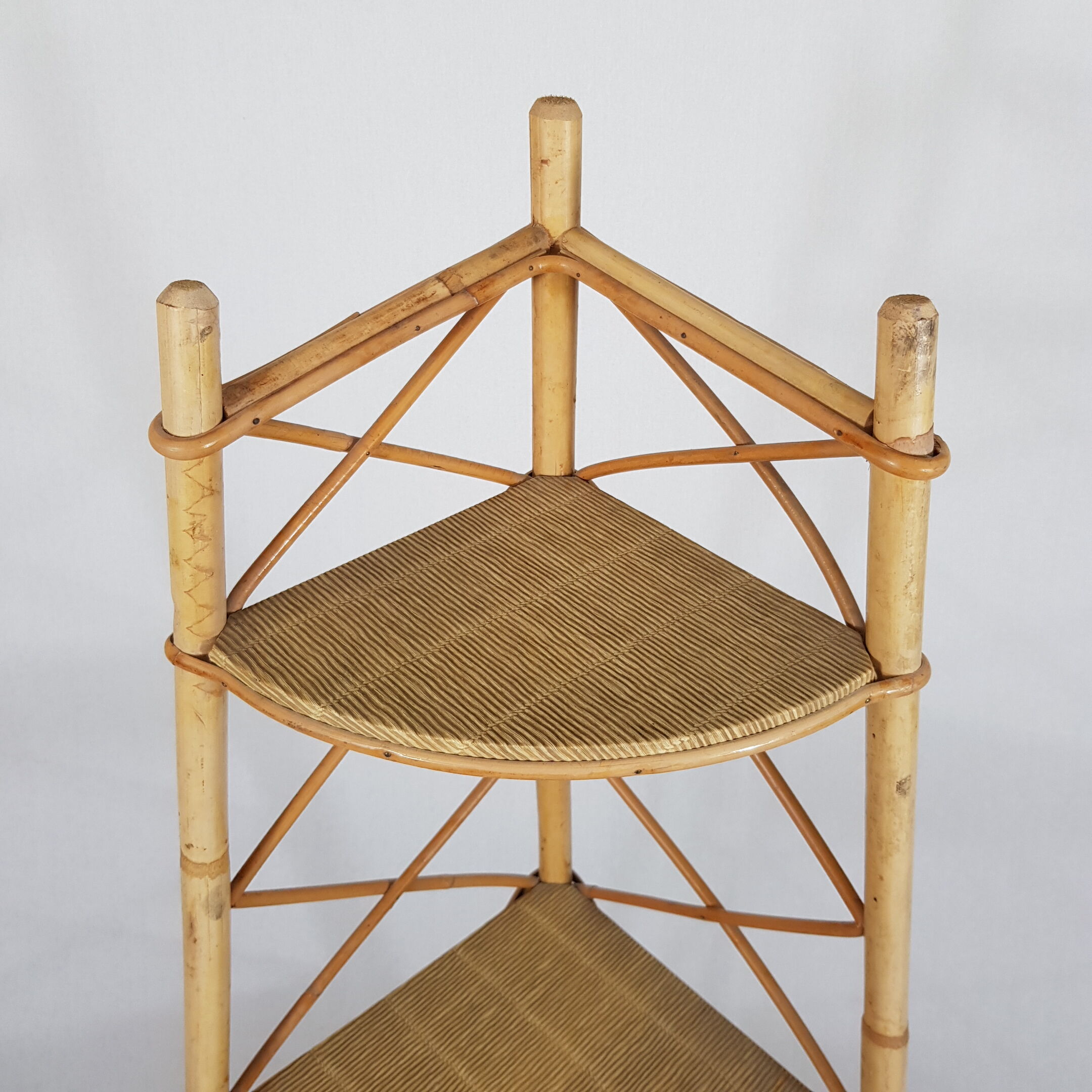 Rattan corner shelf