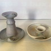 Pair of signed ceramic candlesticks