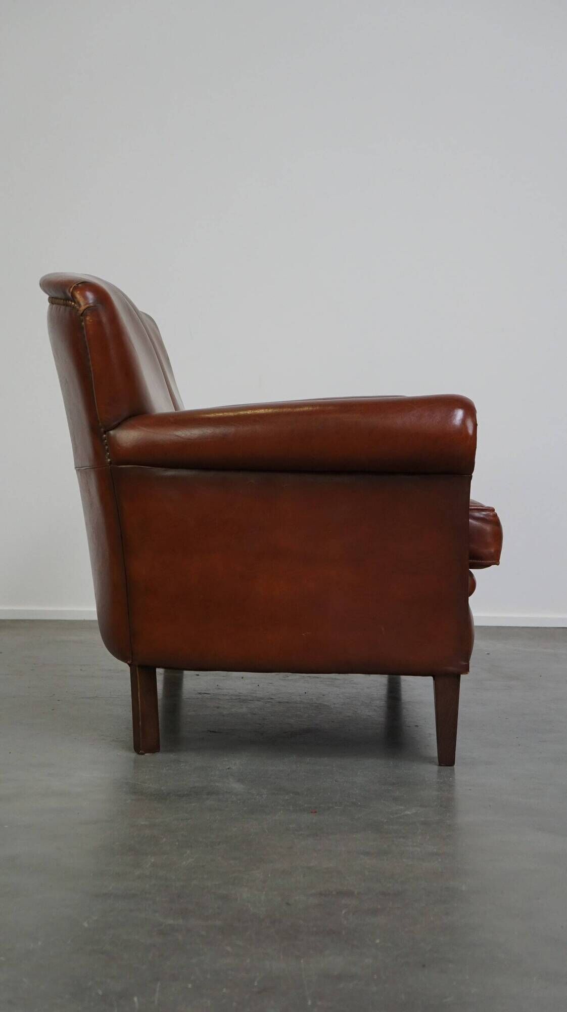 Classic 2 seater sheepskin sofa with beautiful colours and good seating comfort