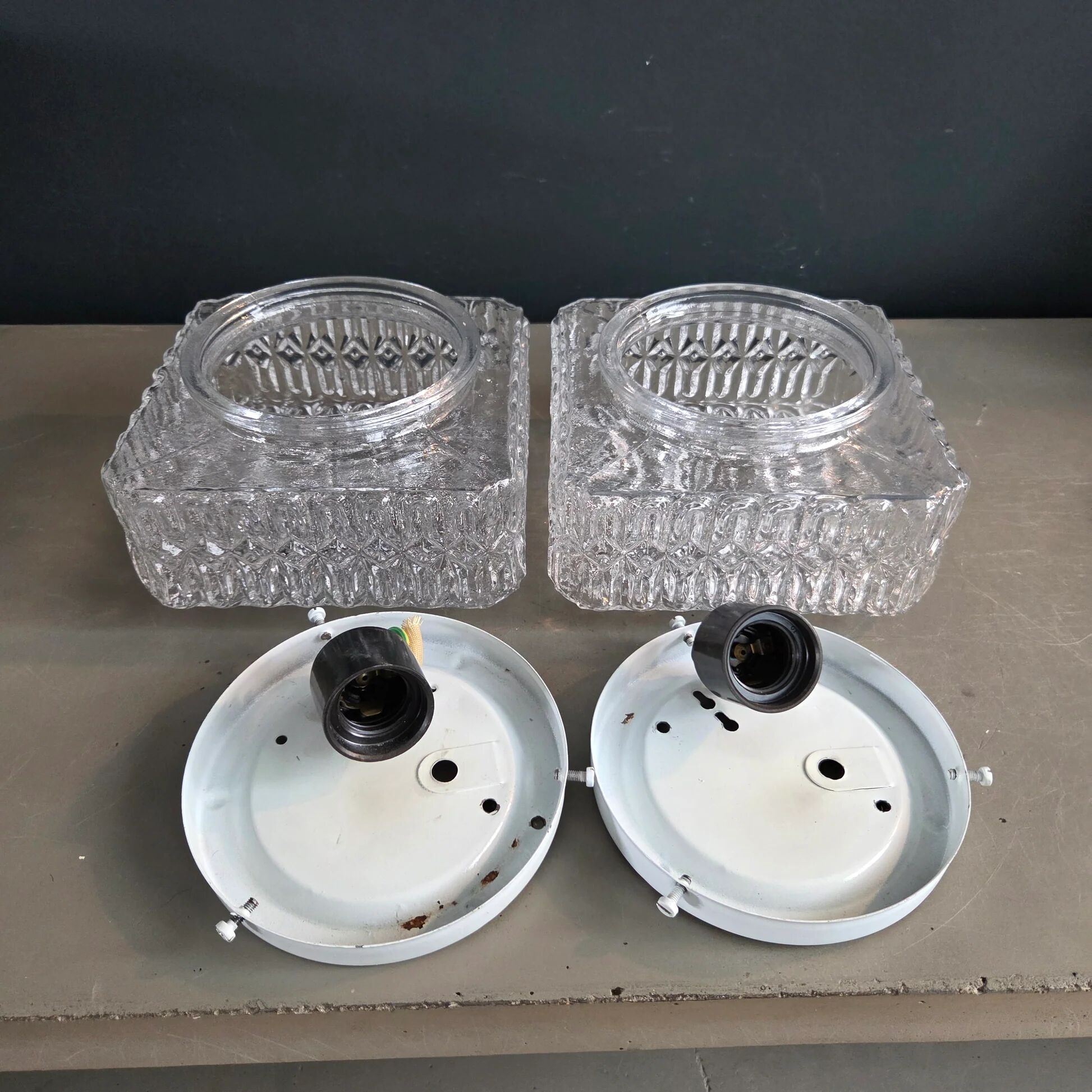 Pair of ceiling lights or moulded glass wall lights.