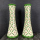 Pair of cornet vases in fine earthenware decorated with flowers in a green mesh
