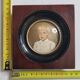 Miniature portrait of a young boy signed, wooden frame with convex glass, 12x12 cm.