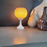 60's table lamp with tulip base and stretched wire shade.