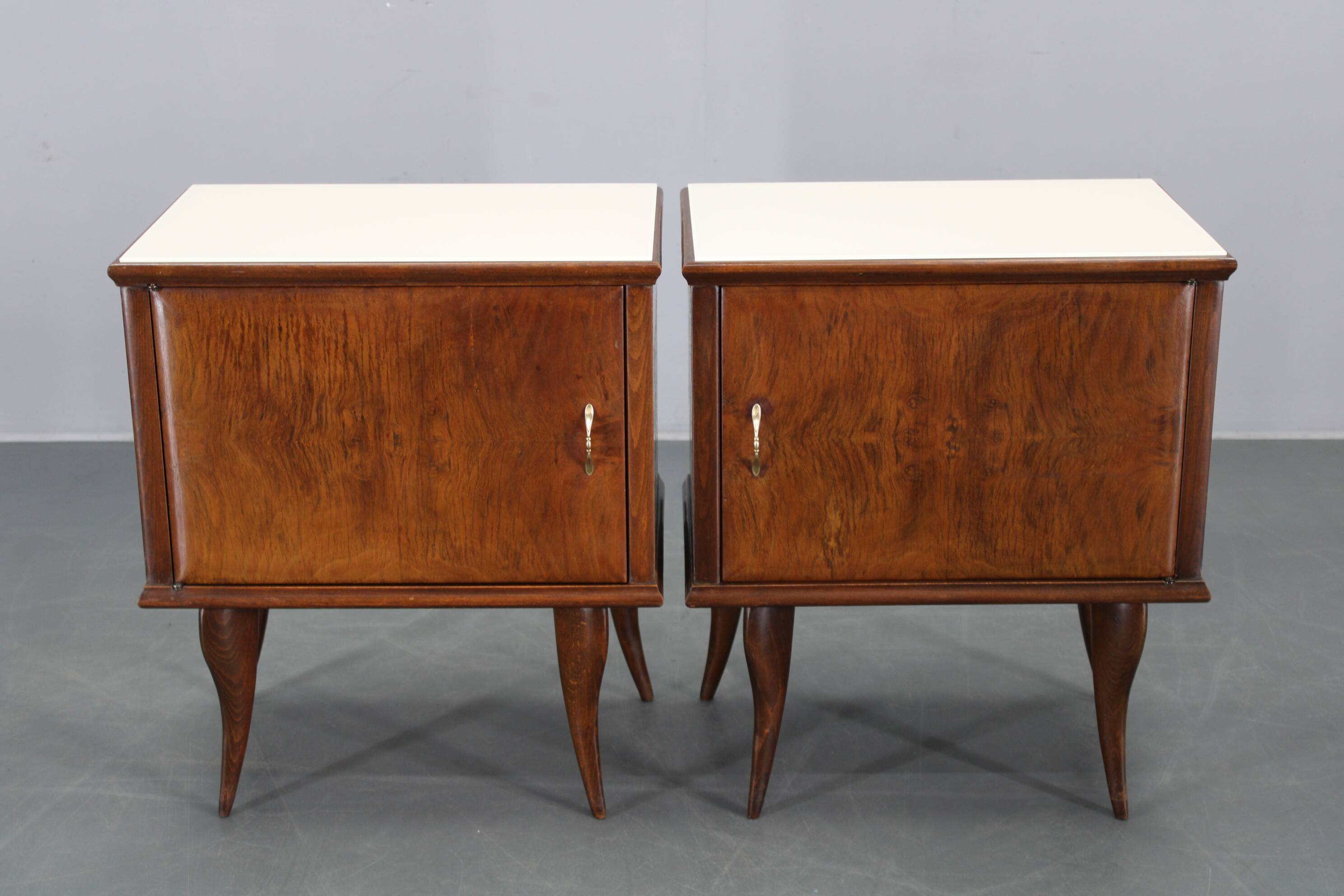Pair of mid-century Italian walnut nightstands with glass top, 1950s