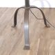 Hammered iron floor lamp in the style of Marolles