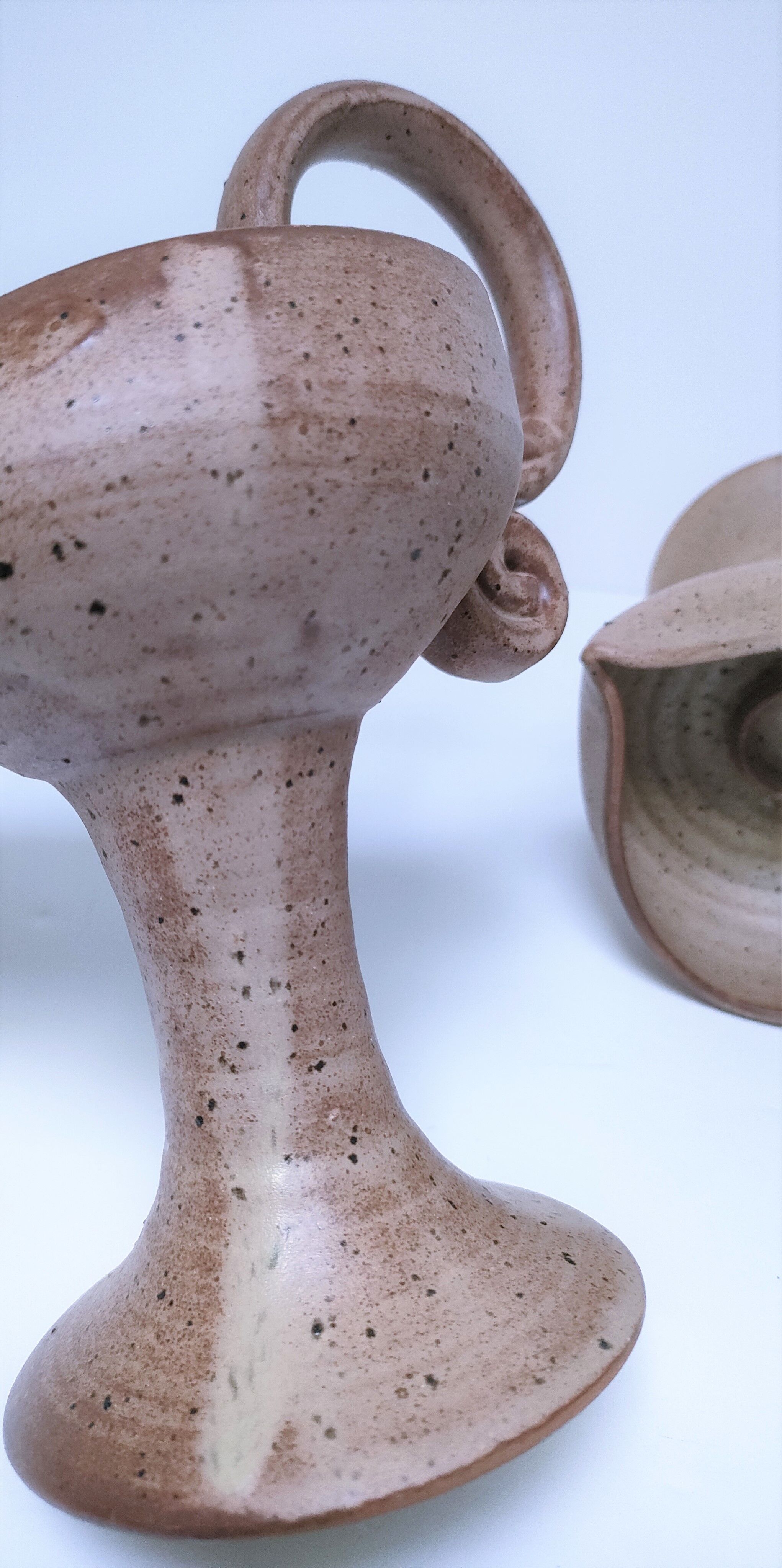 Pair of vintage “heart” sandstone candlesticks