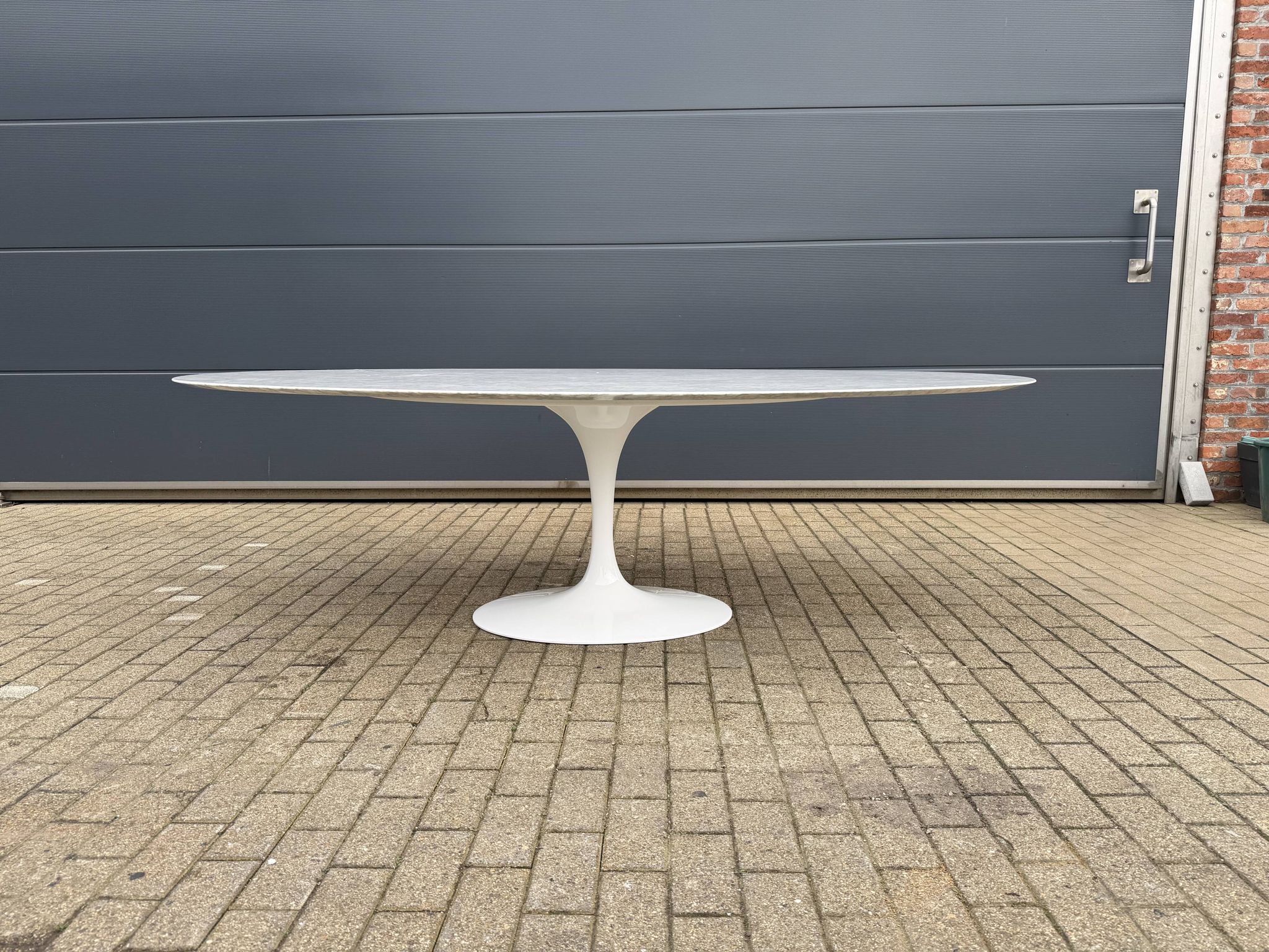 Original Knoll Tulip oval dining table (244cm) in Carrara marble.