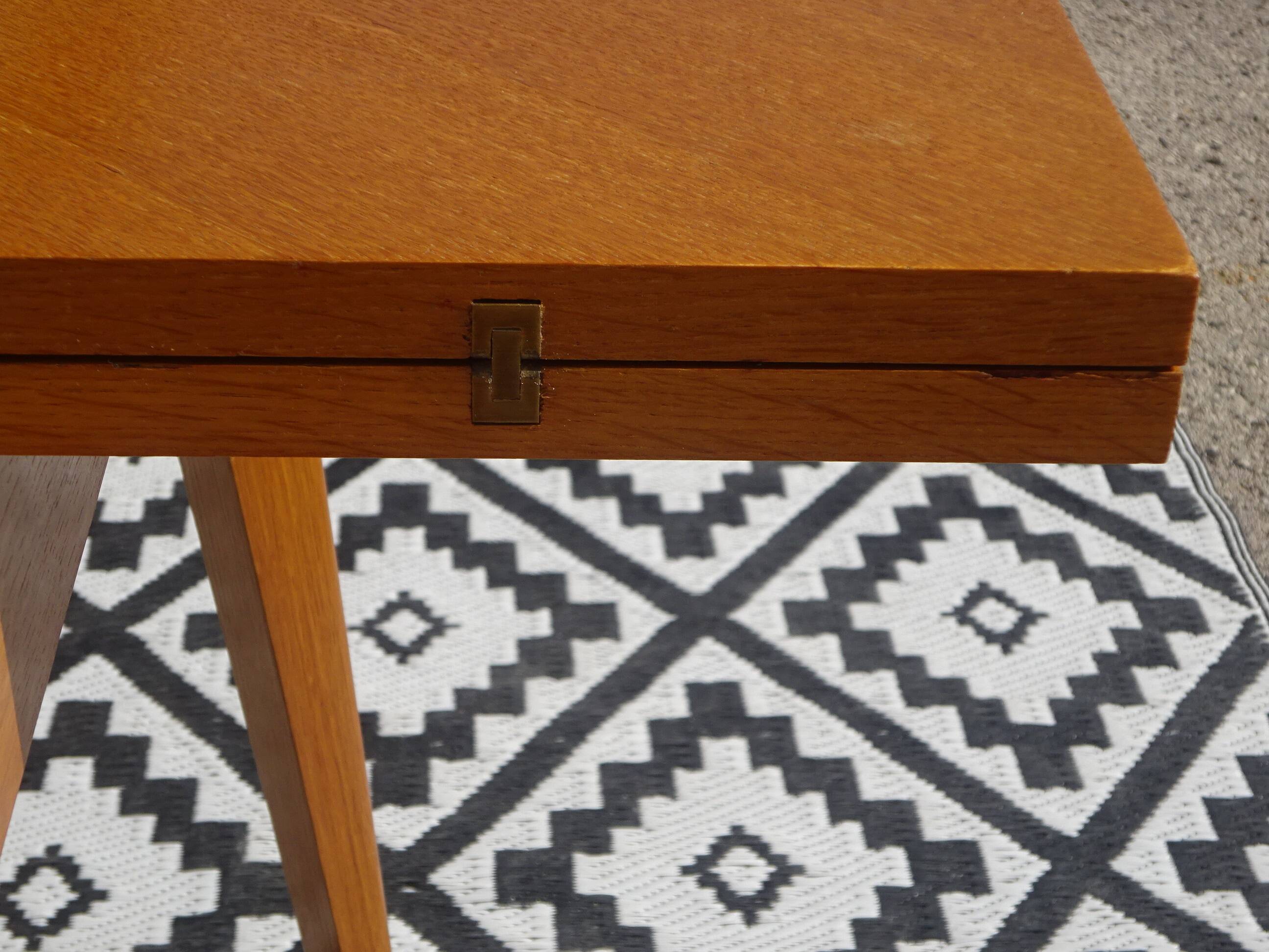 Scandinavian portfolio table model "half-century" by SAM