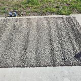 Rug in the style of a designer.