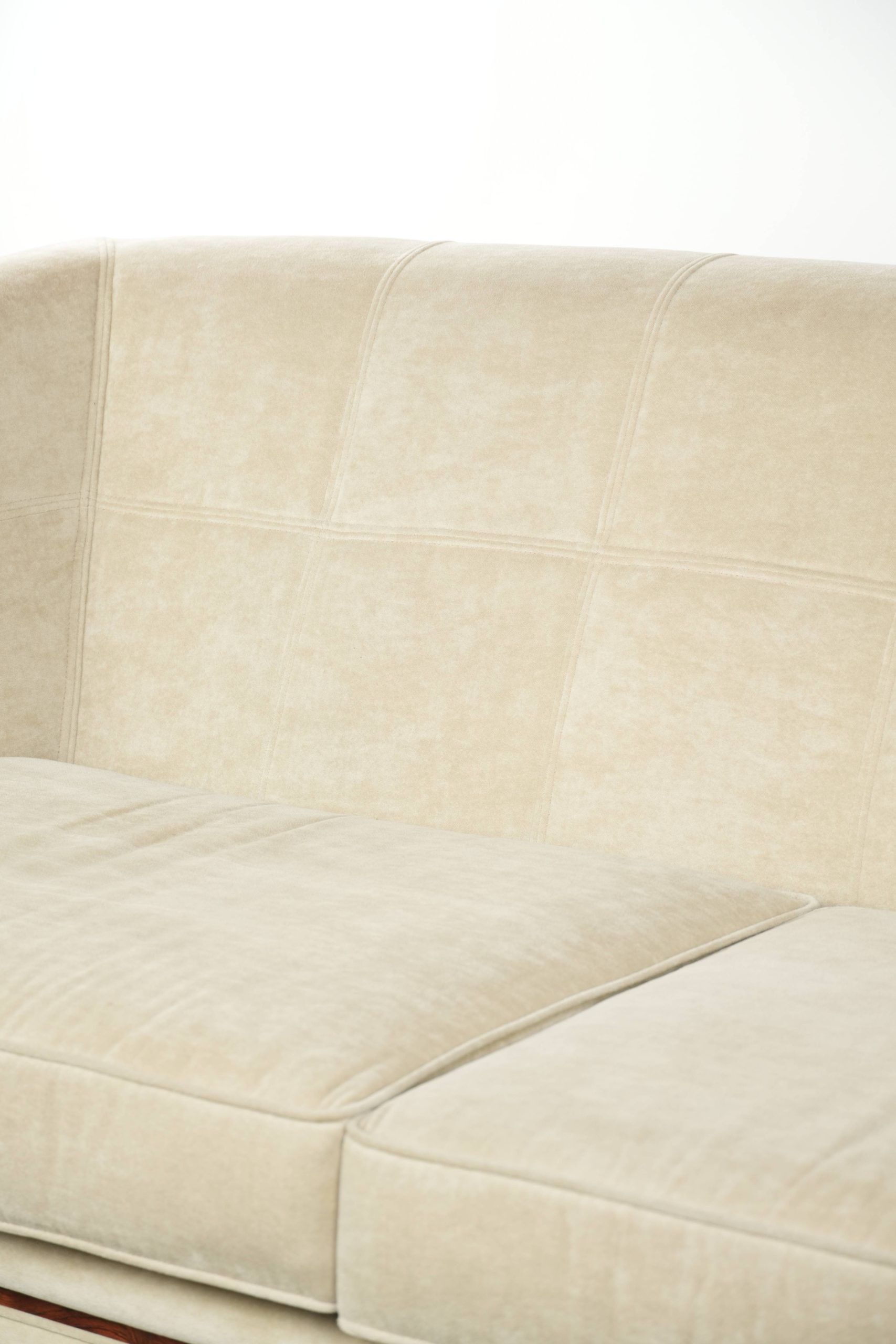 Art Deco design sofa with beautiful woodwork and cream fabric upholstery