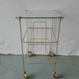 Brass and glass magazine door