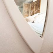 Dismantled Space Age XXL wall mirror in lacquered wood. France, 1970s.