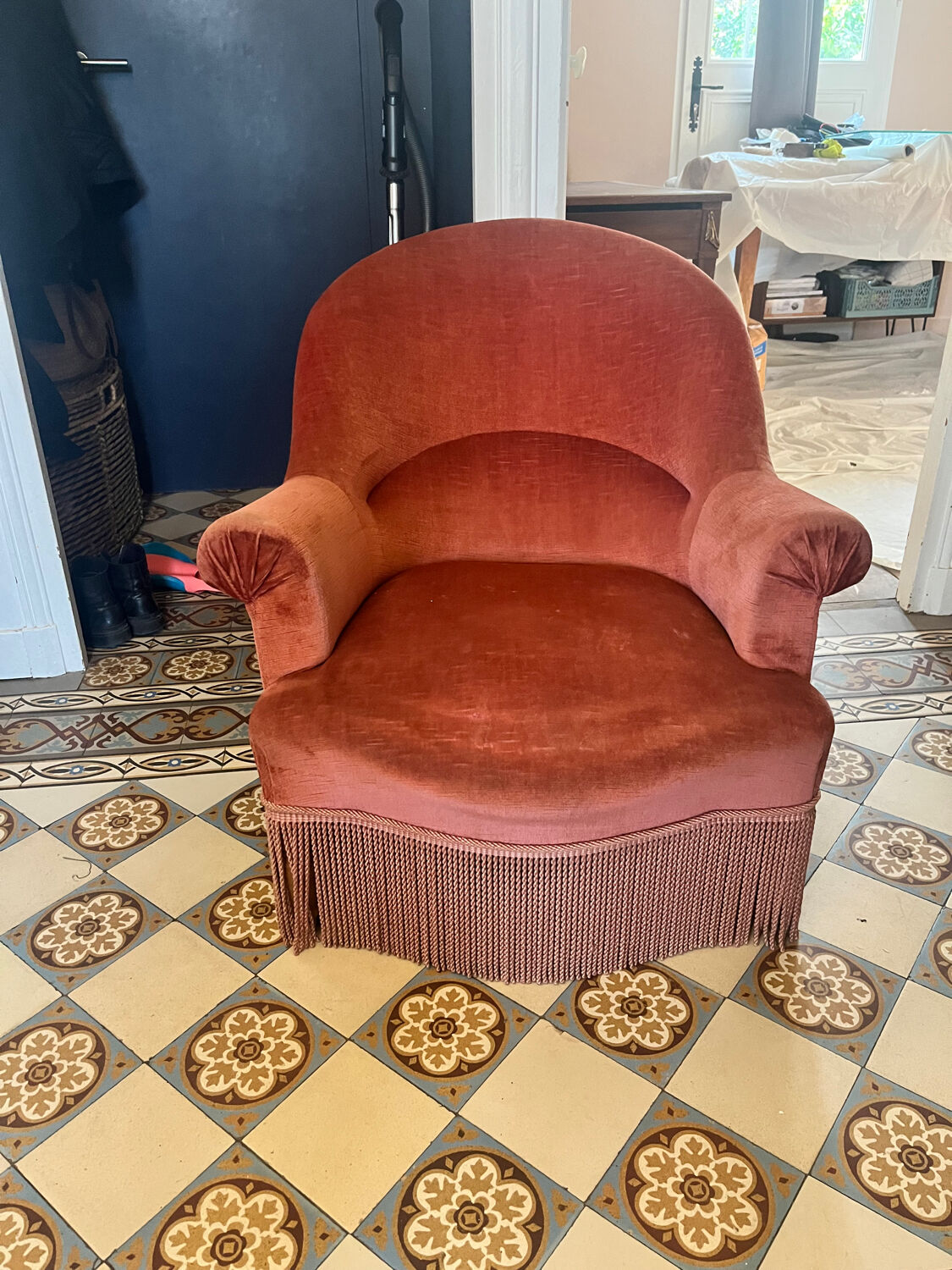 Old pink velvet armchair