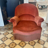 Old pink velvet armchair