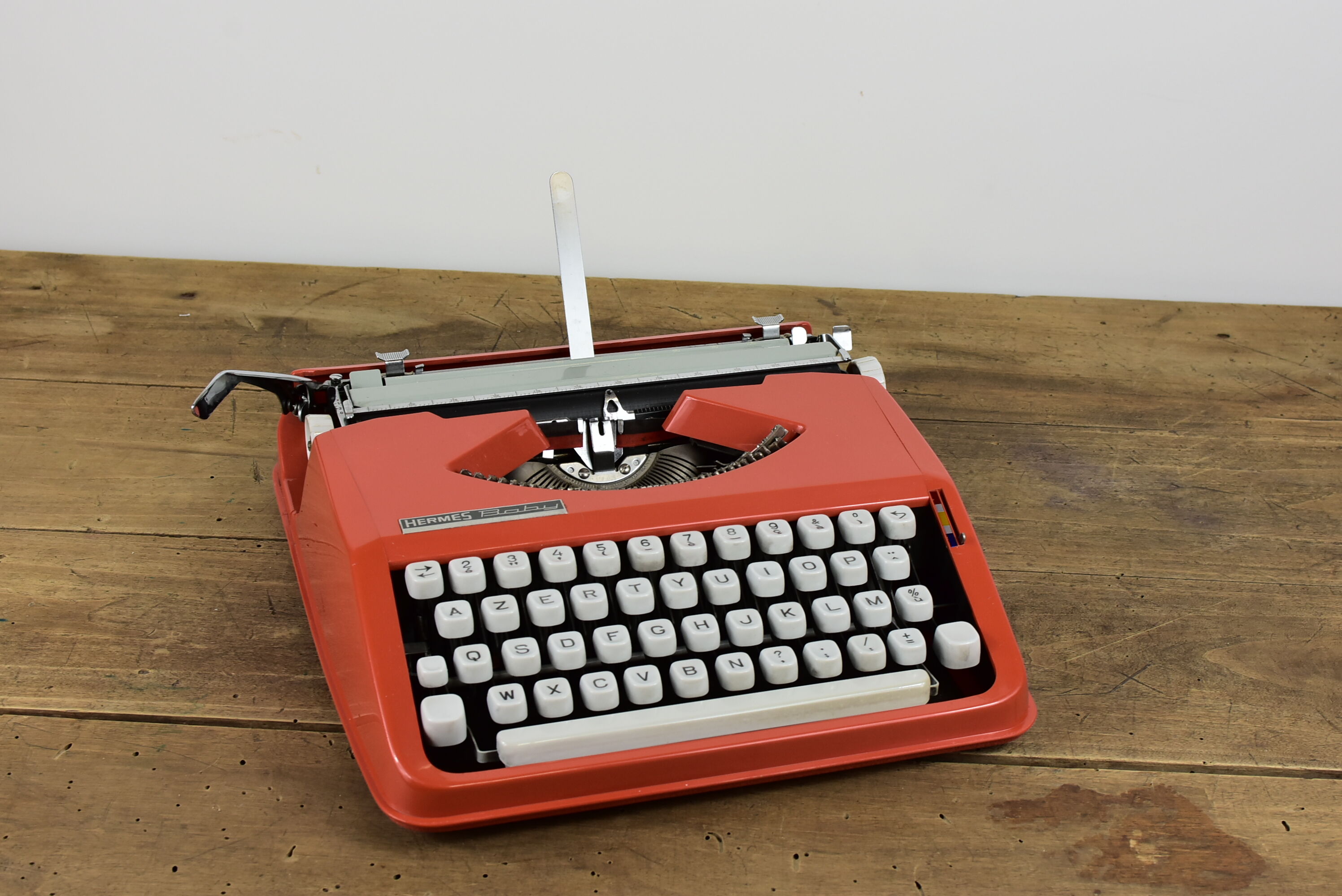 Hermès Baby orange typewriter.