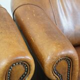 Set of 2 sheep leather club chairs in a cognac color