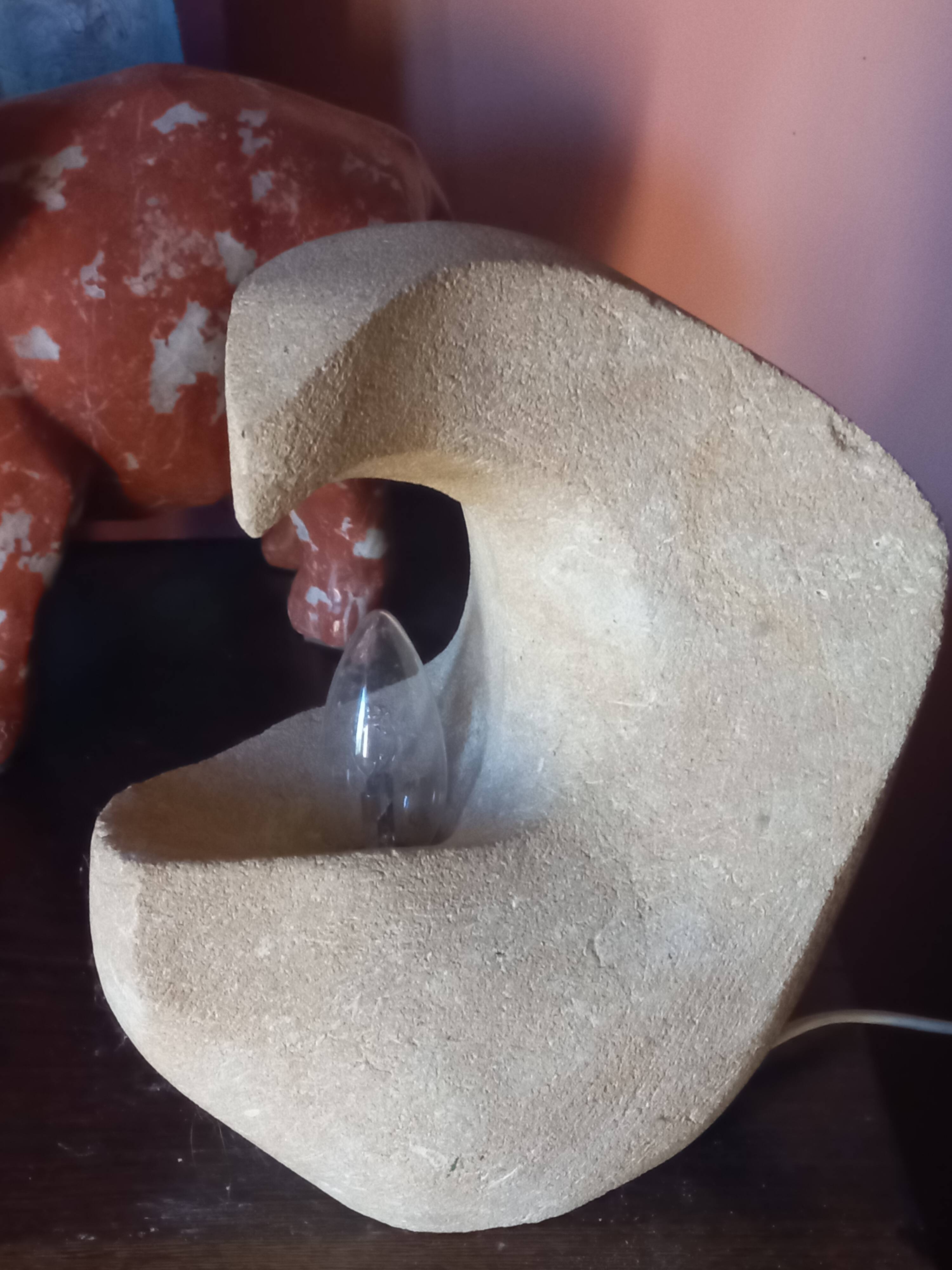 Sculpted stone lamp from the 1970s, signed.