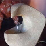 Sculpted stone lamp from the 1970s, signed.