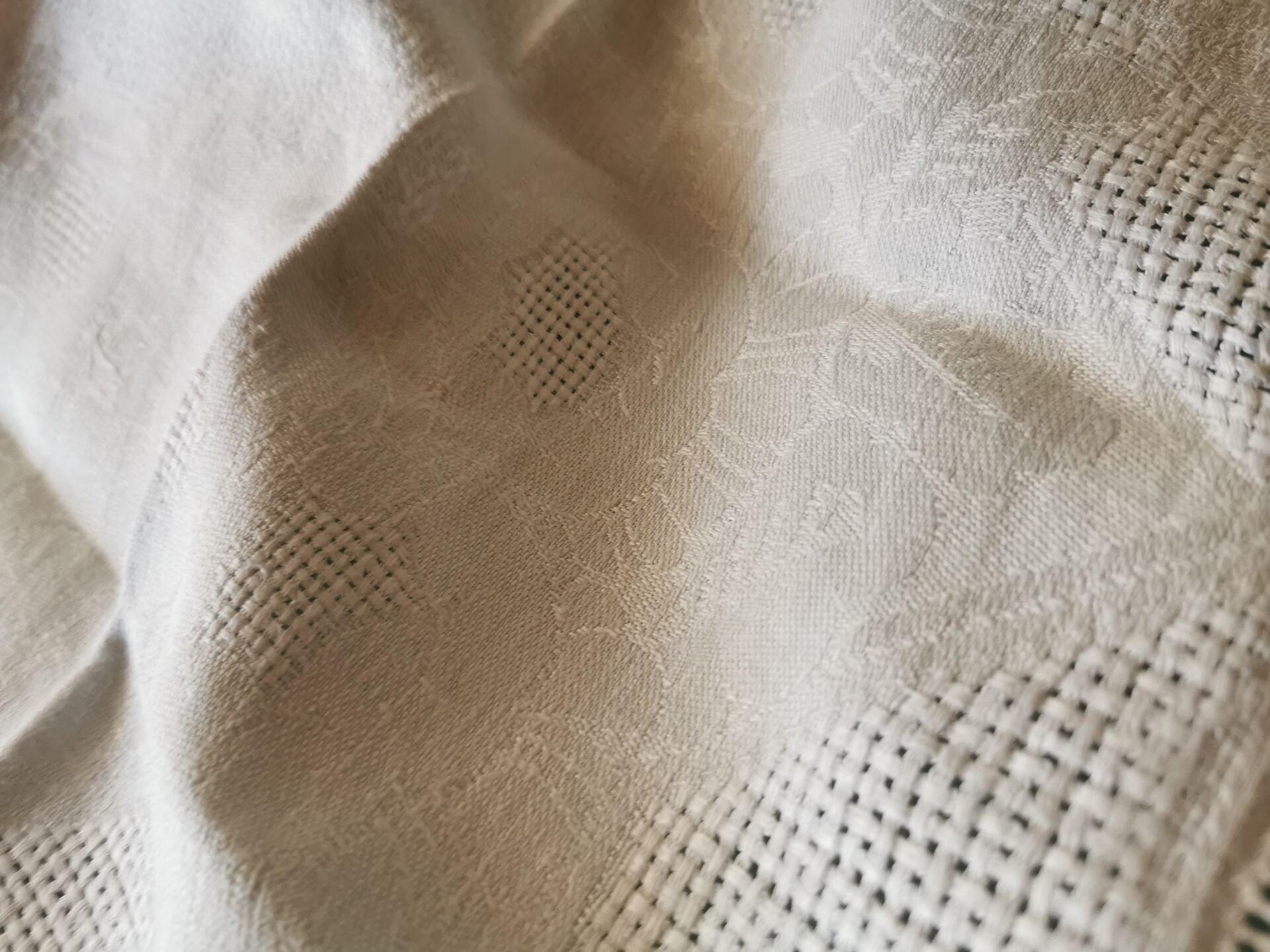 Set of 16 table napkins and an old floral damask tablecloth.