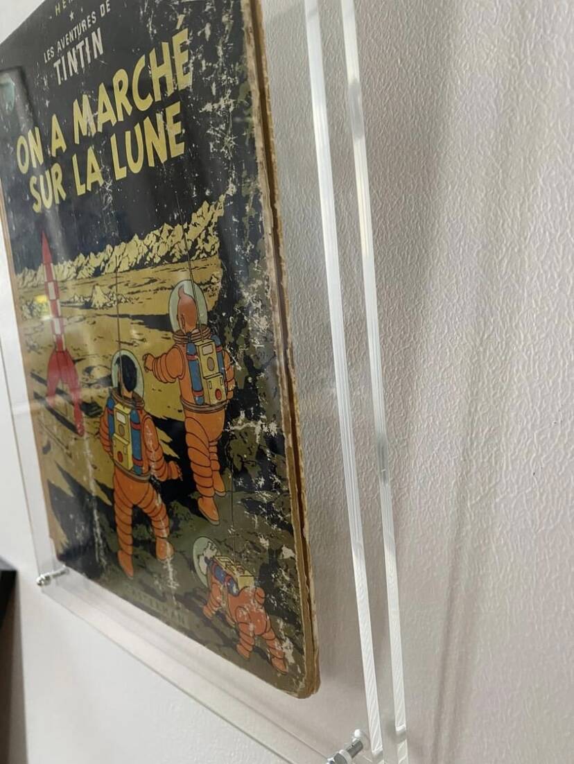 Plexiglas frame with original comic book