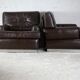 Pair of armchairs brown leather base stainless steel, France, circa 1970