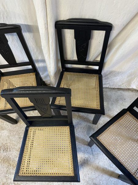 Black chairs and cannage